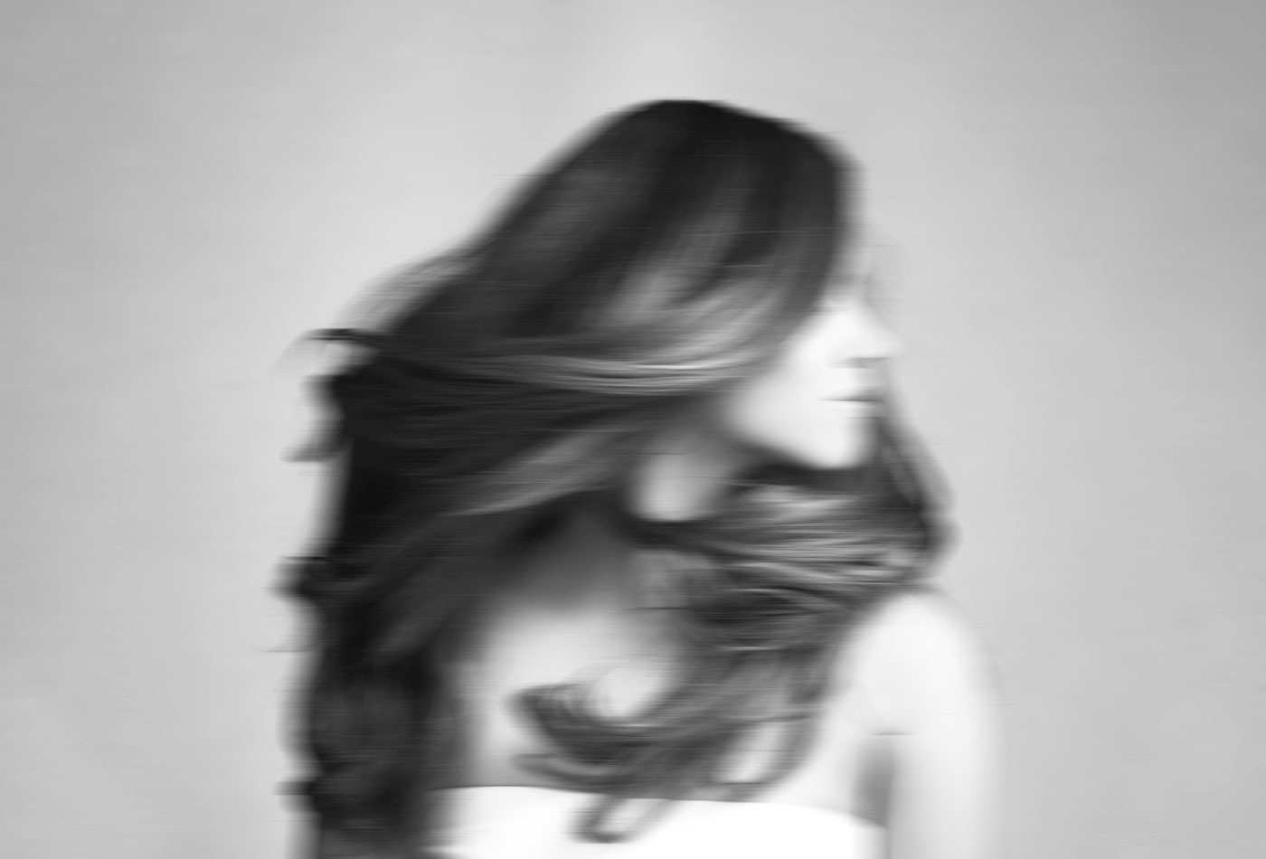 blurred image of woman moving